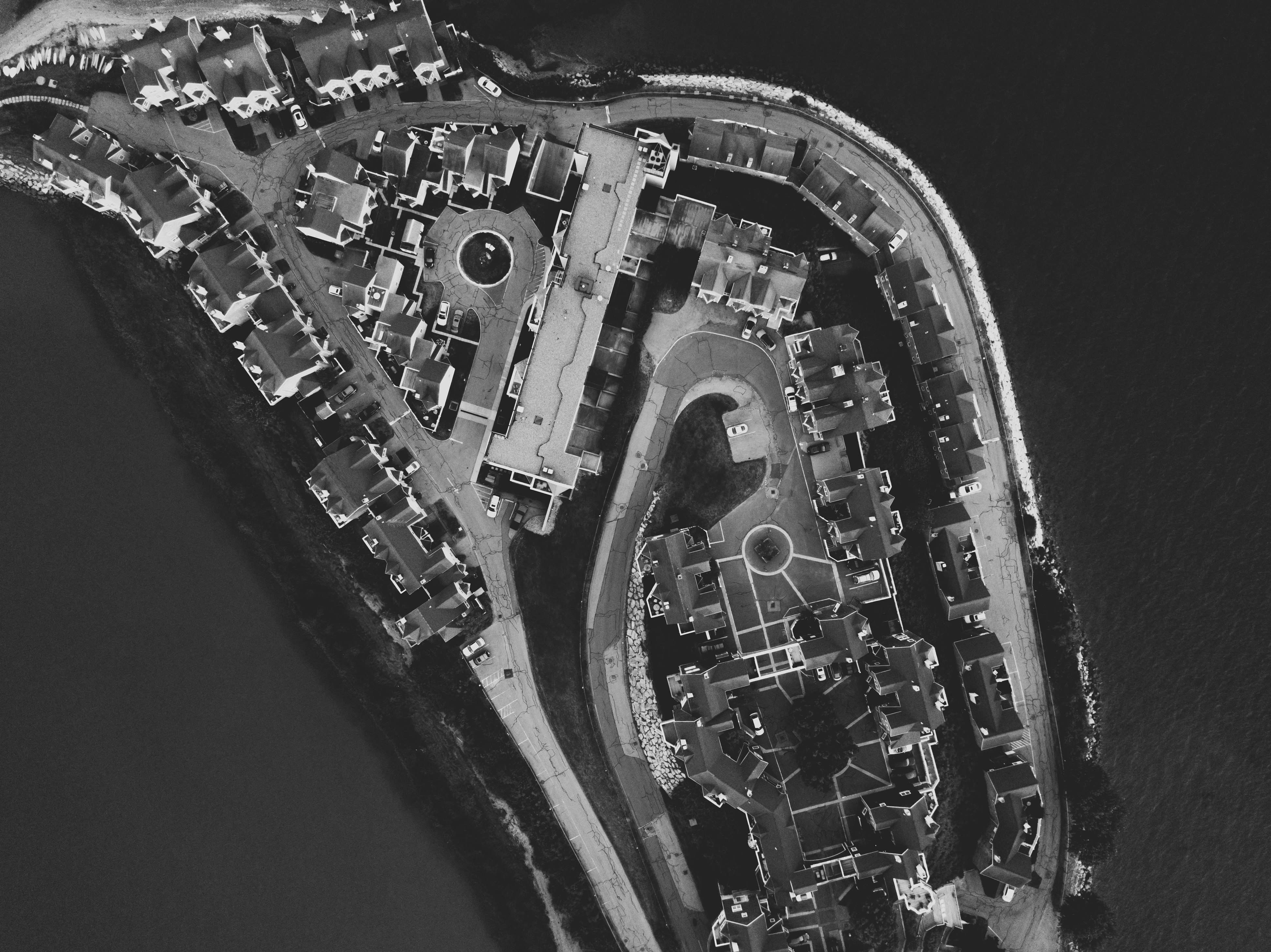 grayscale aerial photography of city islet